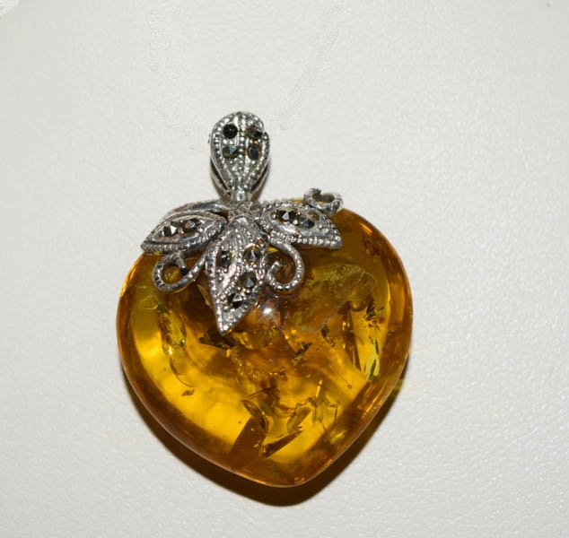 Sterling & Marcasite Amber Heart Pendant: Weighs 7.25grams Measures 26.5mm wide 33.5mm drop Stamped 925