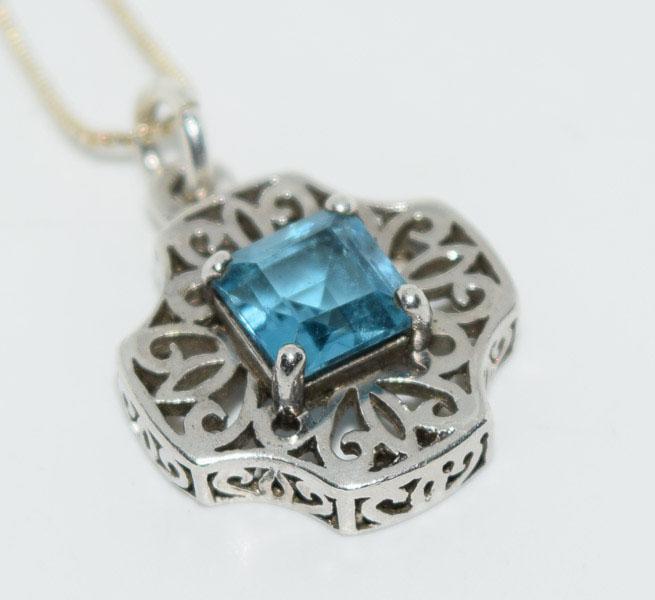 Sterling Spinel Cut out Design Necklace: Weighs 3.6grams Measures 15mm wide 21.5mm drop 18.5inch Box Chain Stamped 925 Tested Spinel