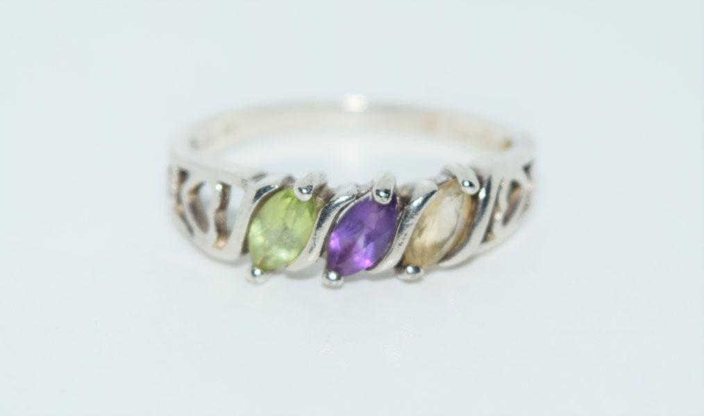 Sterling Avon Birthstone Ring Sz8.25: Weighs 2.2grams Measures 6.5mm at widest Size 8.25 Stamped Avon 925 NV Tested Peridot Amethyst & Citrine