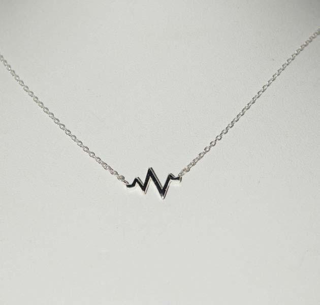 18 inch Sterling Silver Dainty Heart Beat Necklace: Weighs 1.38grams Measures 8.3 x 15.3mm 18inches long Stamped 925