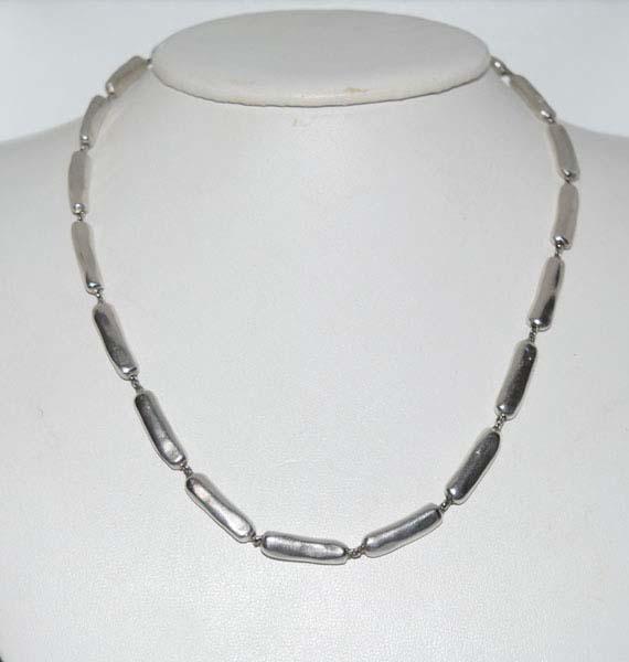 Silver Tone Oblong Link Guess Necklace: Weighs 32.3grams Measures 5.2mm wide 16-17inches long Stamped Guess