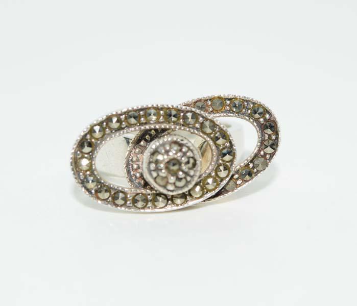 Sterling Silver Marcasite Spinner Ring Sz7: This ring measures a 20mm wide face a size 7 weighs 10.4 grams & stamped 925.