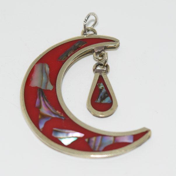 Alpaca Silver Pendant: Item Details:Alpaca Silver Moon Pendant Type: Pendant Length: 43.1 mm Width: 31.2 mm Other: Stone Type: Abalone Stone Cut: Inlaid Stone Color: Multi Shape/Style: Crescent Moon Carats: Not Reviewed Wei