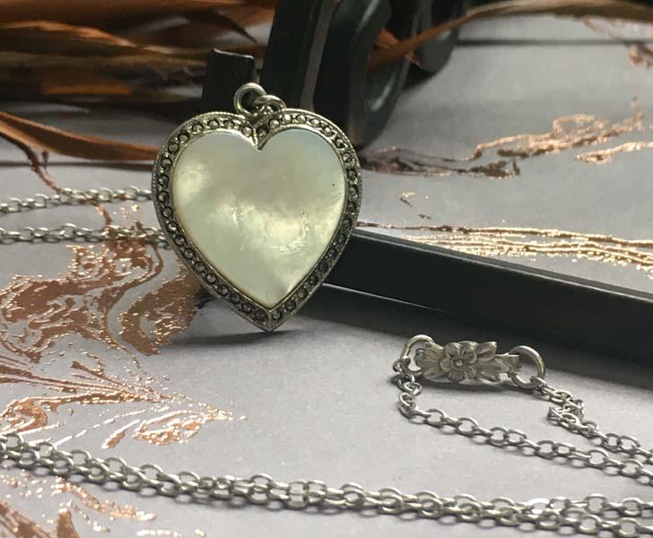 Sterling Silver MOP & Marcasite Heart Necklace: Item Details: sterling silver mother of pearl and marcasite heart necklace | Measurement: 18 inch length, 25.7mm pendant drop, 22mm pendant width | Hallmarks & Stamps: sterling | Weight in grams: 7.5 