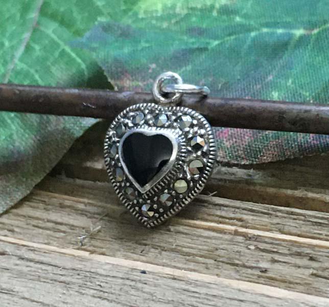 Sterling Silver Marcasite Heart Pendant: Item Details: sterling silver marcasite pendant | Measurement: 19.5mm drop, 2.7mm width | Hallmarks & Stamps: 925 | Weight in grams: 1.3 grams | Shipping Time: Usually 2-5 Business Days | Shipping Rat