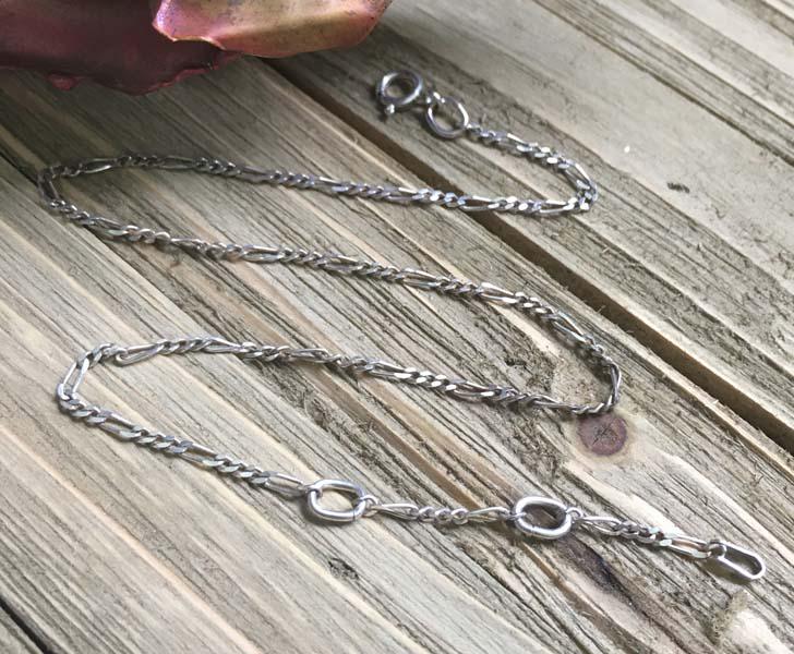 Sterling Silver Figaro Bracelet or Anklet: Item Details: sterling silver figaro bracelet or anklet | Measurement: 10.5 inch-12 inch length, 1.7mm width | Hallmarks & Stamps: 925 | Weight in grams: 2.2 grams | Shipping Time: Usually 2-5 Busines