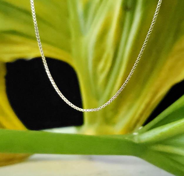 Sterling Silver Chain: Item Details:Sterling Silver Chain Type: Box Chain Length: 19.5 Inches Width: 0.75 mm Other: Spring Ring Closure Stone Type: None Stone Cut: N/A Stone Color: N/A Shape/Style: Box Chain Carats: N/A Wei