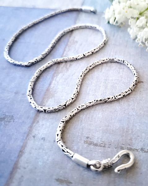 Sterling Silver Byzantine Chain: Item Details:Sterling Silver Byzantine Chain Type: Chain Necklace Length: 16 Inches Width: 2.3 mm Other: Stone Type: None Stone Cut: N/A Stone Color: N/A Shape/Style: Carats: Weight in Grams: 12 Hallm