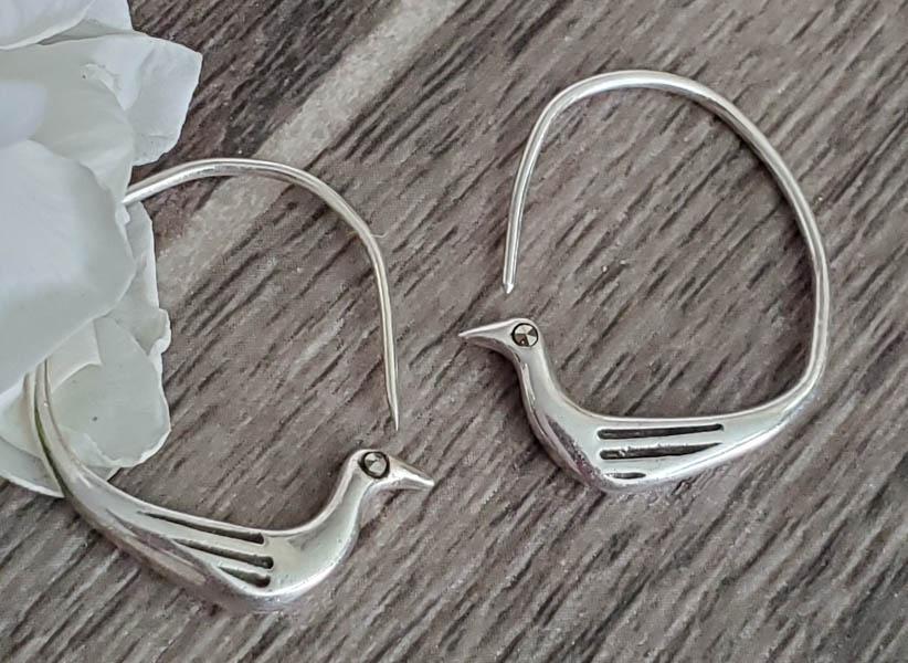 Sterling Silver Boma Earrings: Item Details: Boma Bird Hoops Length or Drop: 30 mm Width: 3 mm Stone Type: Weight in Grams: 5.34 Hallmarks and Stamps: 925, Boma Other: Marcasite Eyes Shipping Time: Usually 2-5 Business Days Shippin
