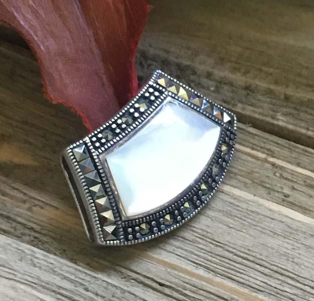 Sterling Silver Marcasite MOP Slide Pendant: Item Details: sterling silver marcasite mother of pearl slide pendant | Measurement: 18.8mm drop, 28mm width | Hallmarks & Stamps: 925 | Weight in grams: 6.2 grams | Shipping Time: Usually 2-5 Busines