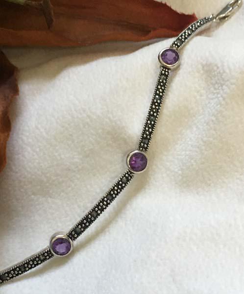 Sterling Silver Bracelet: Item Details: sterling silver marcasite & amethyst bracelet Measurement: 7 inch length, 6.2mm width at widest Hallmarks & Stamps: 925 A China Weight in grams: 8.3 grams Shipping Time: Usually 2-5 Busi