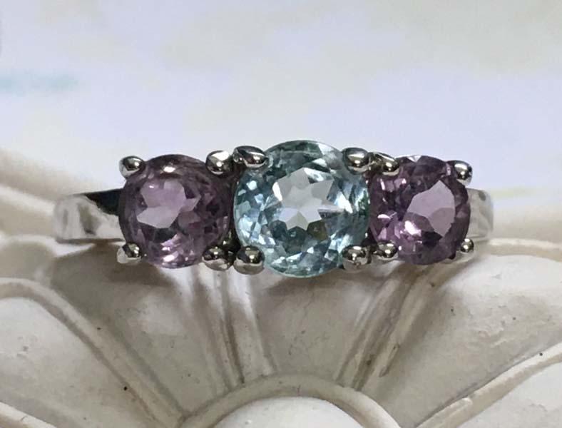 Sterling Silver Topaz & Amethyst Ring Sz 7: Item Details: sterling silver topaz and amethyst ring Size: 7 Measurement: 6mm width Hallmarks & Stamps: 925 ATI China Weight in grams: 3.5 grams Shipping Time: Usually 2-5 Business Days Shipping Rate