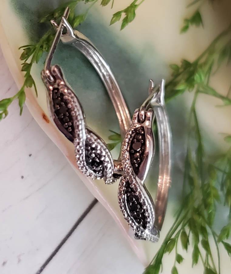 Sterling Silver Diamond Earrings: Item Details: Black Diamond Accent Earrings Length or Drop: 17.5 mm Width: 4 mm Weight in Grams: 2.54 Hallmarks and Stamps: 925, Star Other: