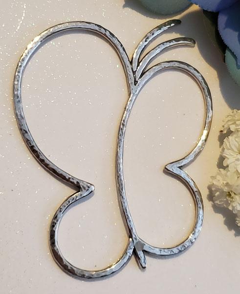 Sterling Silver Pendant: Item Details: Sterling Silver Pendant Type: Pendant Length: 77 mm Width: 61 mm Shape/Style: Large Butterfly Weight in Grams: 12.7 Hallmarks and Stamps: None Tested 925