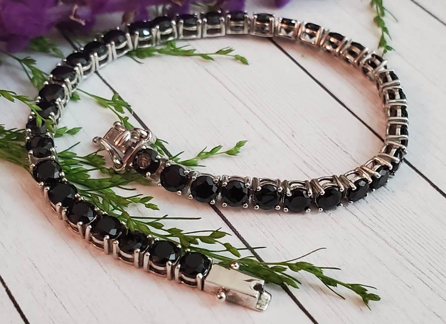 Sterling Silver Tourmaline Bracelet: Item Details: Sterling Silver Tourmaline Tennis Bracelet Length: 7.5 Inches Width: 4 mm Clasp: Box Weight in Grams: 10 Hallmarks and Stamps: Star, 925, China Other: Inter clasp marked stainless