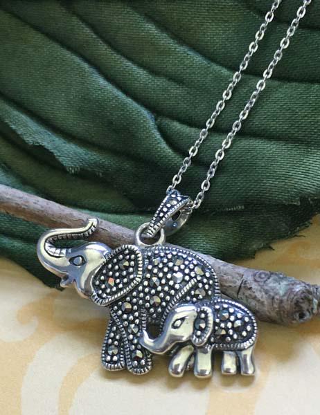 Sterling Silver Elephant Necklace: Item Details: sterling silver marcasite elephant pendant necklace Measurement: 17.5 inch length, 25mm pendant drop, 28mm pendant width Hallmarks & Stamps: 925 Italy necklace, 925 Thailand pendant Weig