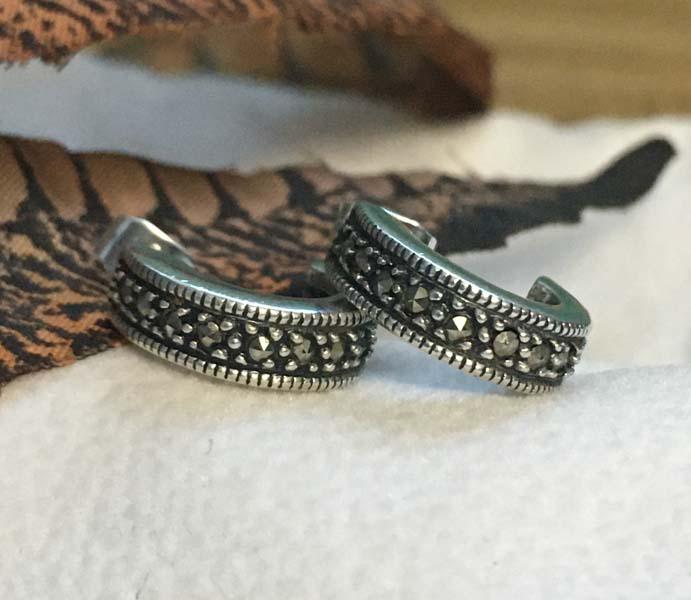 Sterling Silver Marcasite Earrings: Item Details: sterling silver marcasite hoop earrings Measurement: 13.5mm drop, 4.4mm width Hallmarks & Stamps: 925 Weight in grams: 4 grams Shipping Time: Usually 2-5 Business Days Shipping Rates: Sh