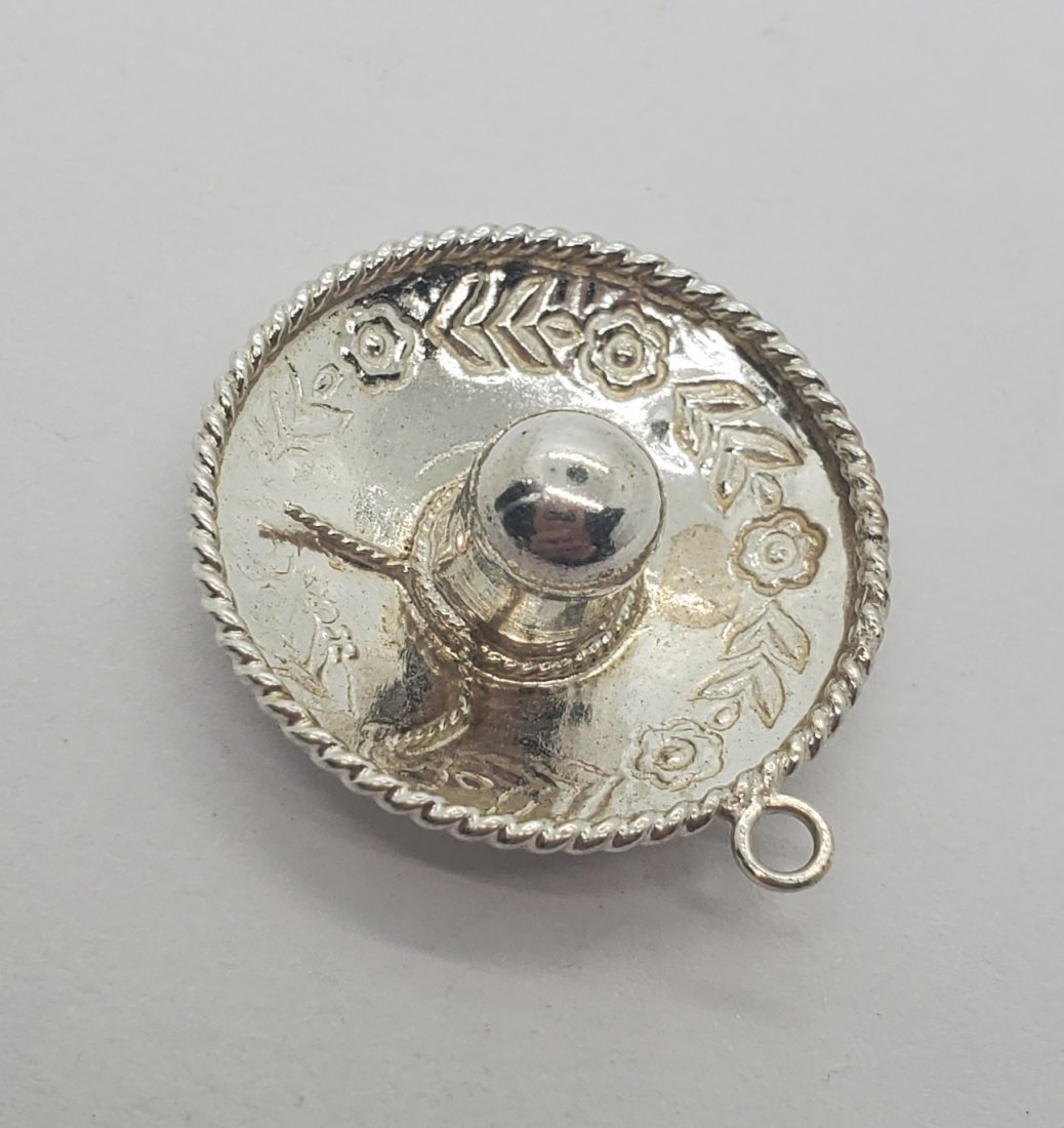 Sterling Silver Sombrero Pendant: Sterling Silver Sombrero Pendant Pendant measure 23.5mm round Shipping Time: Usually 2-5 Business Days Shipping Rates: Shipping rates start at $15 (US Only) for 2-3 Day Priority Mail, contact us for o