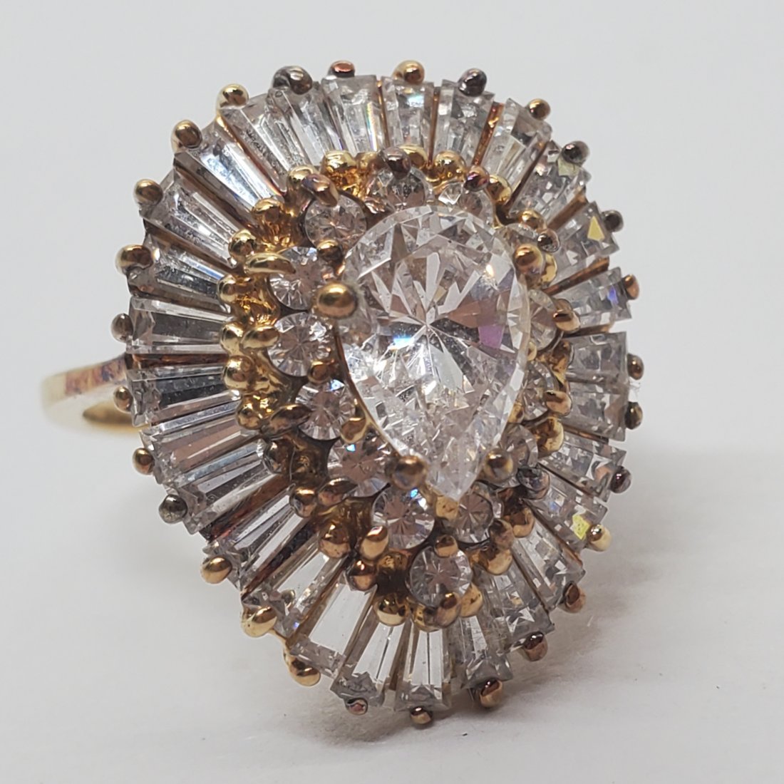 Vermeil CZ Baguette Halo Ring: Vermeil CZ Baguette Halo Ring Measures Size 6.5 with 21.7 mm wide face Shipping Time: Usually 2-5 Business Days Shipping Rates: Shipping rates start at $15 (US Only) for 2-3 Day Priority Mail, contact