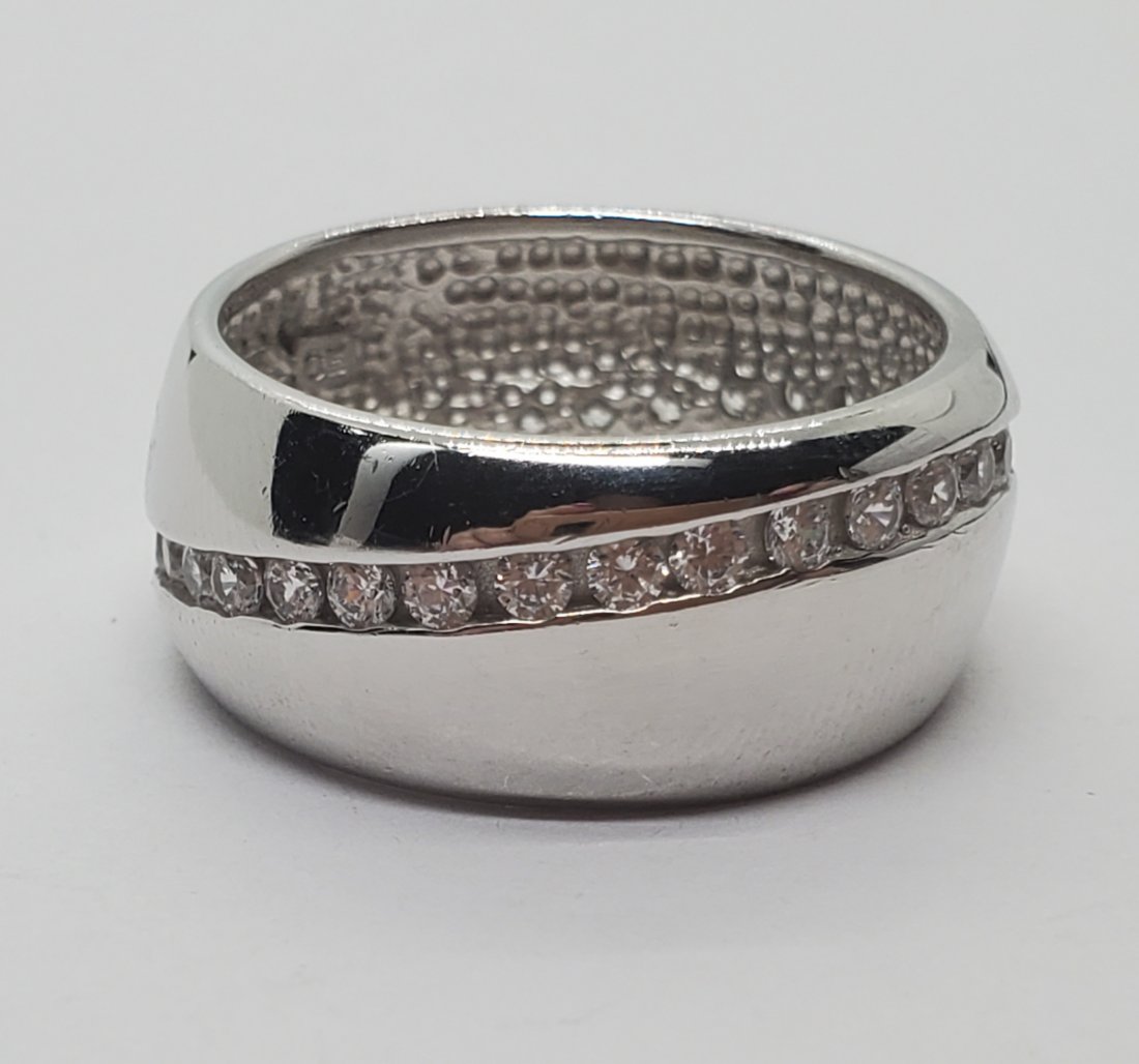 925 Sterling Cz Wide Wrap Band: 925 CZ Wide Band Size 10 Band/Ring Measures 10 mm Wide Shipping Time: Usually 2-5 Business Days Shipping Rates: Shipping rates start at $15 (US Only) for 2-3 Day Priority Mail, contact us for our firs
