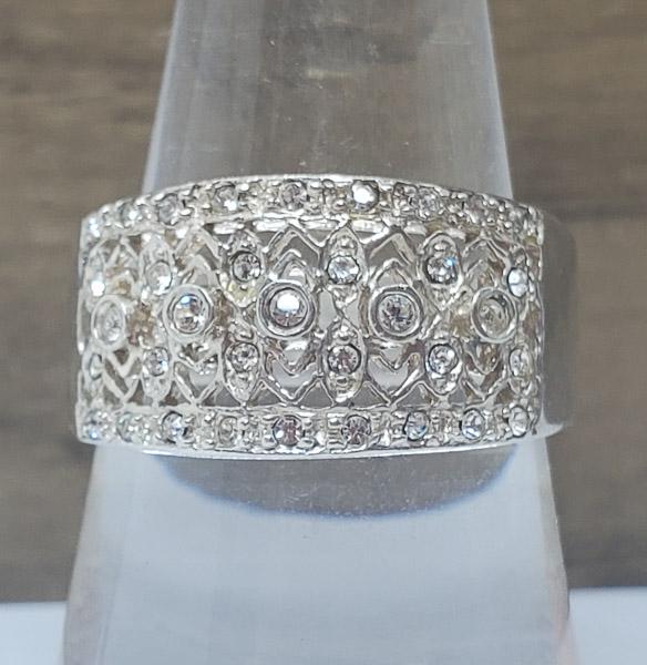 Sterling Silver CZ Filigree Band: Sterling Silver CZ Filigree Band Size 8 Ring Measures 10.7 mm wide Shipping Time: Usually 2-5 Business Days Shipping Rates: Shipping rates start at $15 (US Only) for 2-3 Day Priority Mail, contact us 