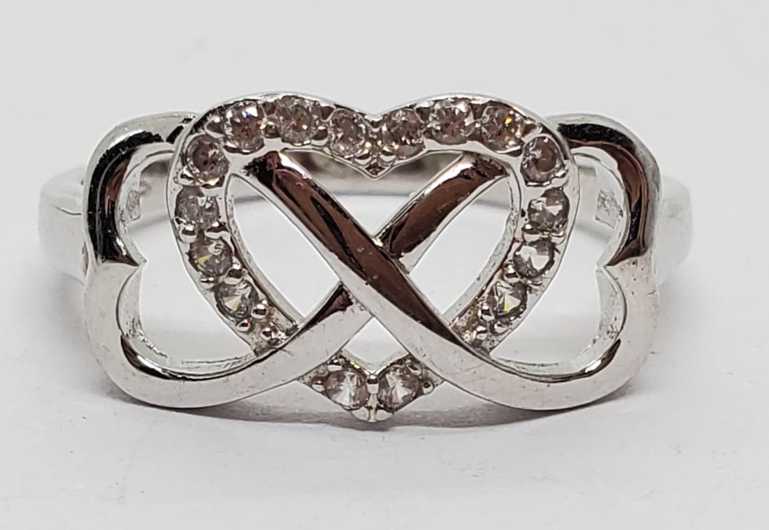 Sterling Infinity and Heart Ring sz 9: Sterling Infinity and Heart Ring sz 9 Shipping Time: Usually 2-5 Business Days Shipping Rates: Shipping rates start at $15 (US Only) for 2-3 Day Priority Mail, contact us for our first-class rates. Co