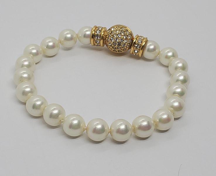 Vintage Christian DIOR Faux Pearl Bracelet: Bracelet is 7.5 inches long and faux pearls are 8mm rounds. Signed Dior Shipping Time: Usually 2-5 Business Days Shipping Rates: Shipping rates start at $15 (US Only) for 2-3 Day Priority Mail, contac
