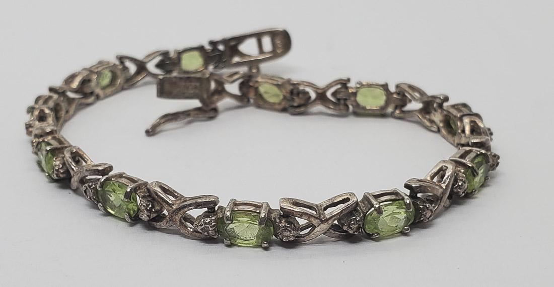 Signed DBJ Peridot and Diamond Sterling Bracelet: Bracelet is 7 inches long and 5mm wide. Shipping Time: Usually 2-5 Business Days Shipping Rates: Shipping rates start at $15 (US Only) for 2-3 Day Priority Mail, contact us for our first-class rates. 