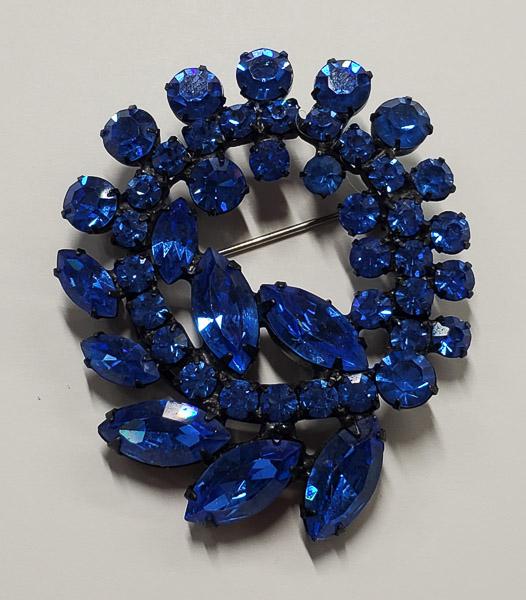 Vintage WEISS Blue Rhinestone Brooch: Measures appx 55mm by 46.5mm. Shipping Time: Usually 2-5 Business Days Shipping Rates: Shipping rates start at $15 (US Only) for 2-3 Day Priority Mail, contact us for our first-class rates. Combined S