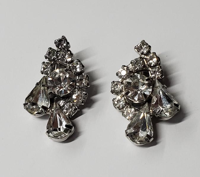 Vintage Rhinestone Clip On Earrings: Vintage Rhinestone Clip On Earrings. Shipping Time: Usually 2-5 Business Days Shipping Rates: Shipping rates start at $15 (US Only) for 2-3 Day Priority Mail, contact us for our first-class rates. Com