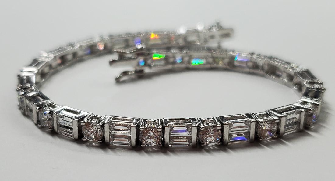 Sterling Silver Tennis Bracelet: Bracelet is 7.5 inches long and 4mm wide. Shipping Time: Usually 2-5 Business Days Shipping Rates: Shipping rates start at $15 (US Only) for 2-3 Day Priority Mail, contact us for our first-class rates