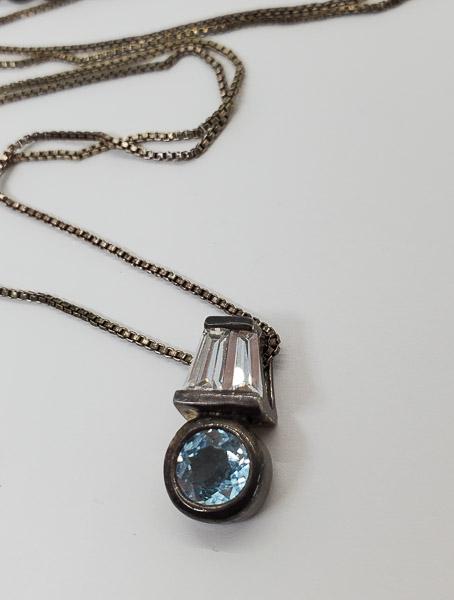 Sterling Silver Topaz Necklace: Has a 20 inch chain with CZ baguettes and topaz. Shipping Time: Usually 2-5 Business Days Shipping Rates: Shipping rates start at $15 (US Only) for 2-3 Day Priority Mail, contact us for our first-clas