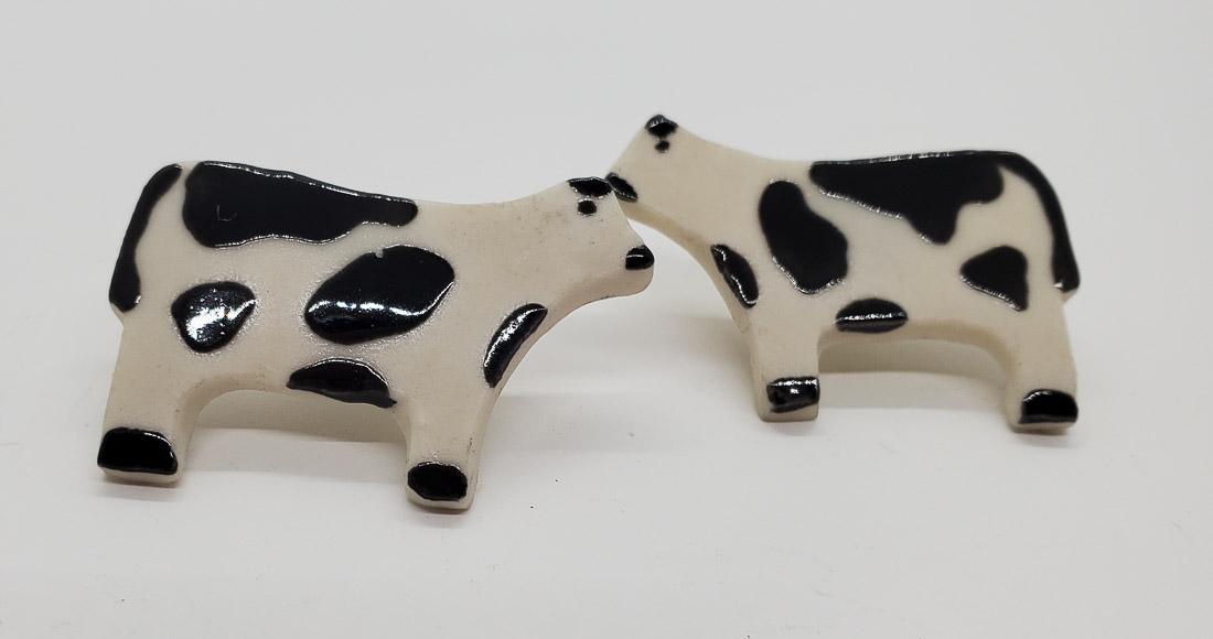 Ceramic Spotted Cow Post Earrings: They have a 26mm drop and are 40.5mm wide. Shipping Time: Usually 2-5 Business Days Shipping Rates: Shipping rates start at $15 (US Only) for 2-3 Day Priority Mail, contact us for our first-class rate