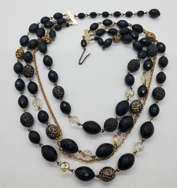 Vintage Germany Crystal and Resin Hook Necklace: Necklace is 16 to 18 inches adjustable. Shipping Time: Usually 2-5 Business Days Shipping Rates: Shipping rates start at $15 (US Only) for 2-3 Day Priority Mail, contact us for our first-class rates. 