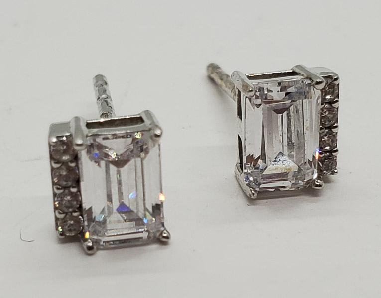 Dainty Sterling Silver Stud Earrings (1 of 3)