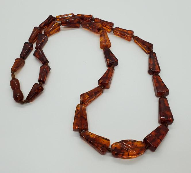 Glowing Vintage Baltic Amber Knotted Necklace: Necklace is 26 inches long. Shipping Time: Usually 2-5 Business Days Shipping Rates: Shipping rates start at $15 (US Only) for 2-3 Day Priority Mail, contact us for our first-class rates. Combined Shi
