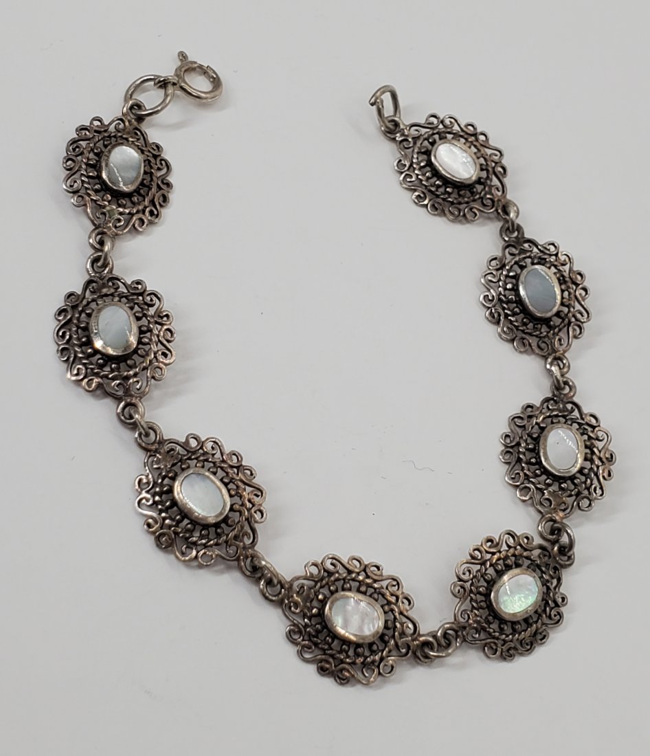 Vintage MOP Sterling Bracelet: Bracelet is 6.75 inches long and links are appx 12.8mm wide. Shipping Time: Usually 2-5 Business Days Shipping Rates: Shipping rates start at $15 (US Only) for 2-3 Day Priority Mail, contact us for ou