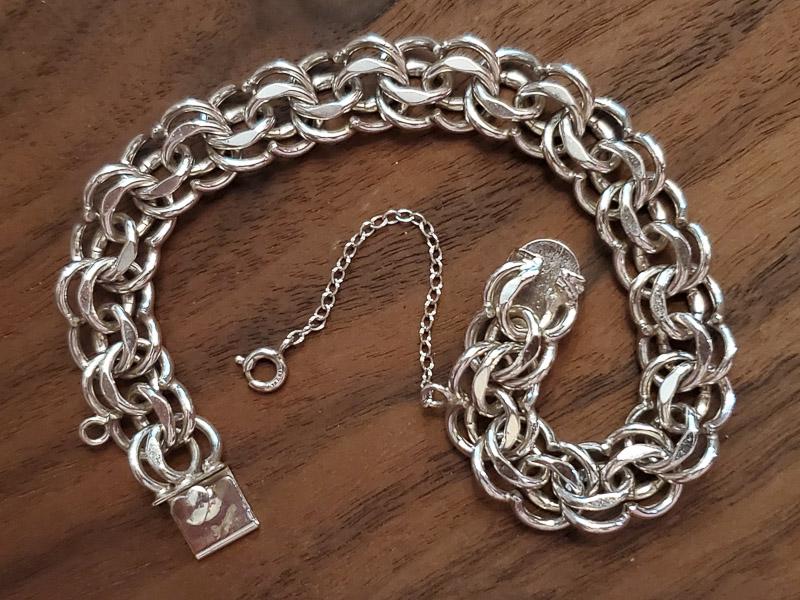 Thick Heavy Circa 1950 Elco Sterling Bracelet: Length: 7.5 inches and is 11.6mm wide Weight in Grams: 29.1 Hallmarks and Stamps: Elco, Sterling Please note: All items are taken at stamped value and are not tested unless stated. As with many vintag