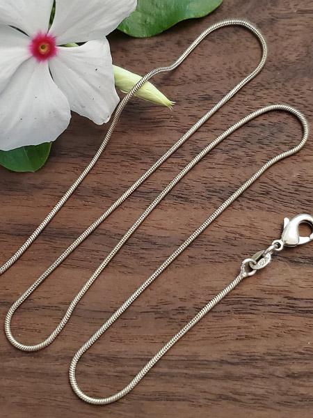 Sterling Silver Snake Chain: Length: 18 inches Weight in Grams: 4.18 Hallmarks and Stamps: 925 Please note: All items are taken at stamped value and are not tested unless stated. As with many vintage items, pieces may have some s