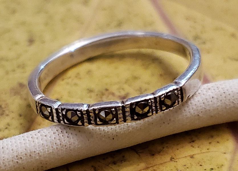 Dainty Marcasite Sterling Silver Ring Sz 7: Please see pics for details as this is the exact item you will receive. Size: 7 Measures: 2.5mm Band Weight in Grams: 1.8 Hallmarks & Stamps Include: 925 Please note: All items are taken at stampe