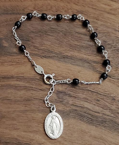 Onyx Beaded Sterling Silver Rosary Bracelet: Please see pics for details as this is the exact item you will receive. Size: 7-7.5 Inches Measures: 3.8mm wide Weight in Grams: 3.9 Hallmarks & Stamps Include: 925, Italy Please note: All items a