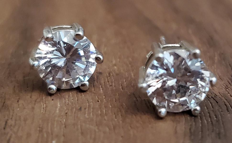 7.5mm Sterling Silver Stud Earrings: Please see pics for details as this is the exact item you will receive. Measures: 7.5mm round Weight in Grams: 2.43 Hallmarks & Stamps Include: 925 Please note: All items are taken at stamped valu