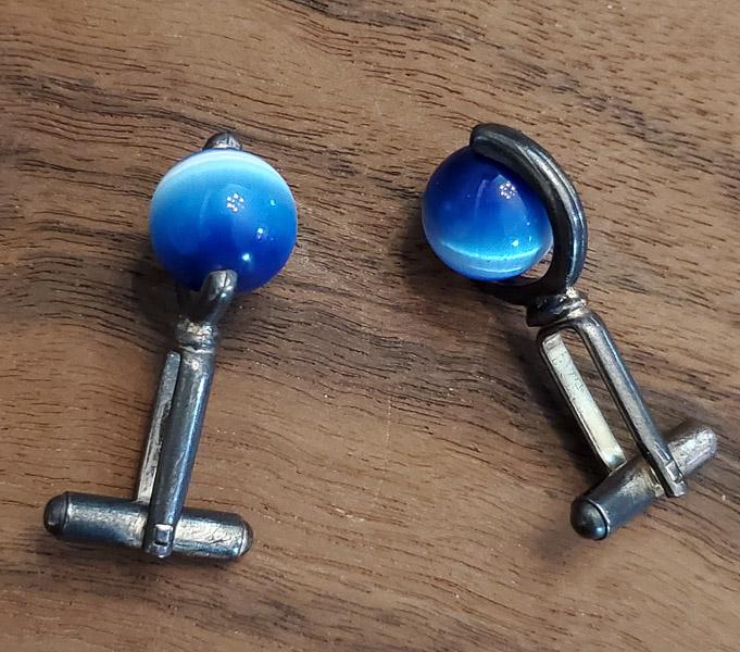 Blue Cats Eye Cufflinks: Measurements: Appx 11mm roundWeight in Grams: 11.59Hallmarks and Stamps: N