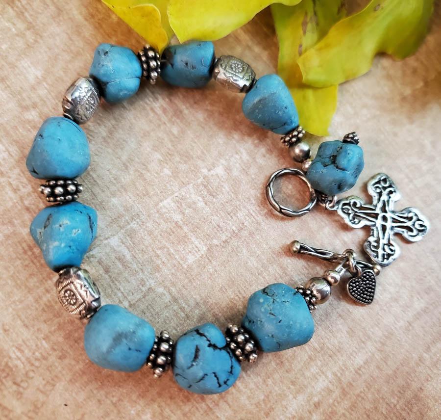 Sterling Silver and Silver Nugget Bracelet: Item Details: Sterling Silver and Silver Nugget Bracelet Length: 8 Inches Width: 13 to 15 mm Clasp: Toggle Weight in Grams: 39.55 Hallmarks and Stamps: 925 Other: Some parts are sterling others are no