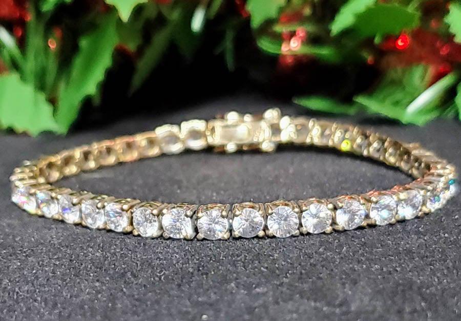 Vermeil Sterling Silver CZ Tennis 7.5" Bracelet: Please see pics for details as this is the exact item you will receive.Ã‚ Size: 7.5 Inches Details: 4.5mm wide Weight in Grams: 9.05 Hallmarks & Stamps Include: 925 Please note: All items are t