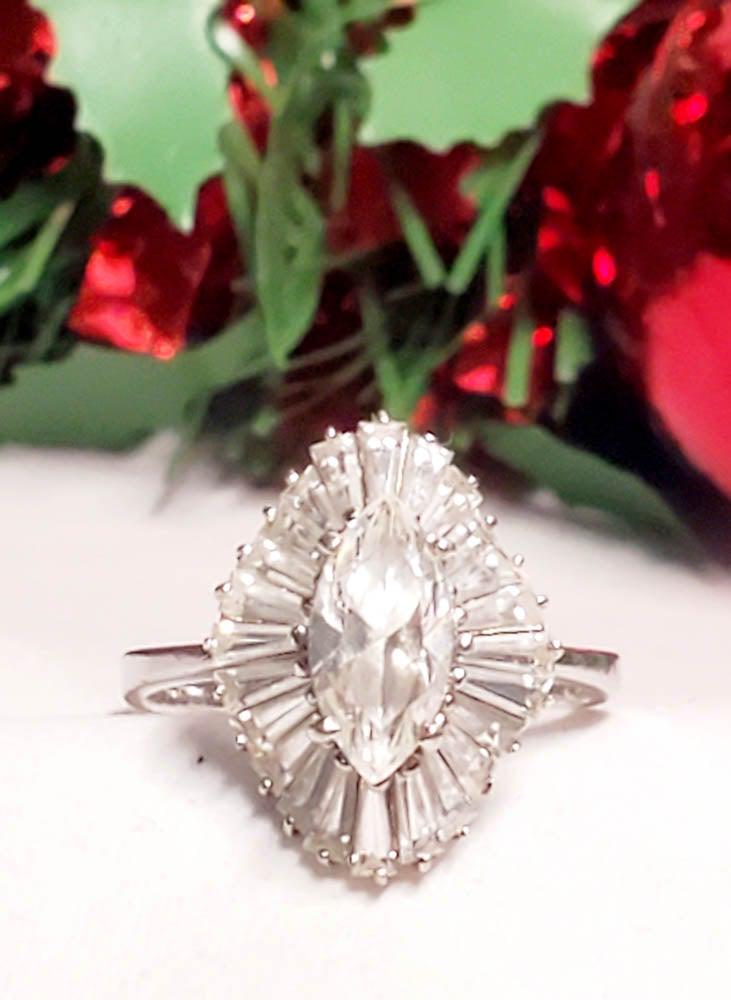 Sterling Silver Marquise and Baguette CZ Ring sz8: Ring Size: 8 Ring Face: 18x13.7mm Width if Band Ring: mm Weight in Grams: 4.38 Hallmarks & Stamps Include: 925 Other: