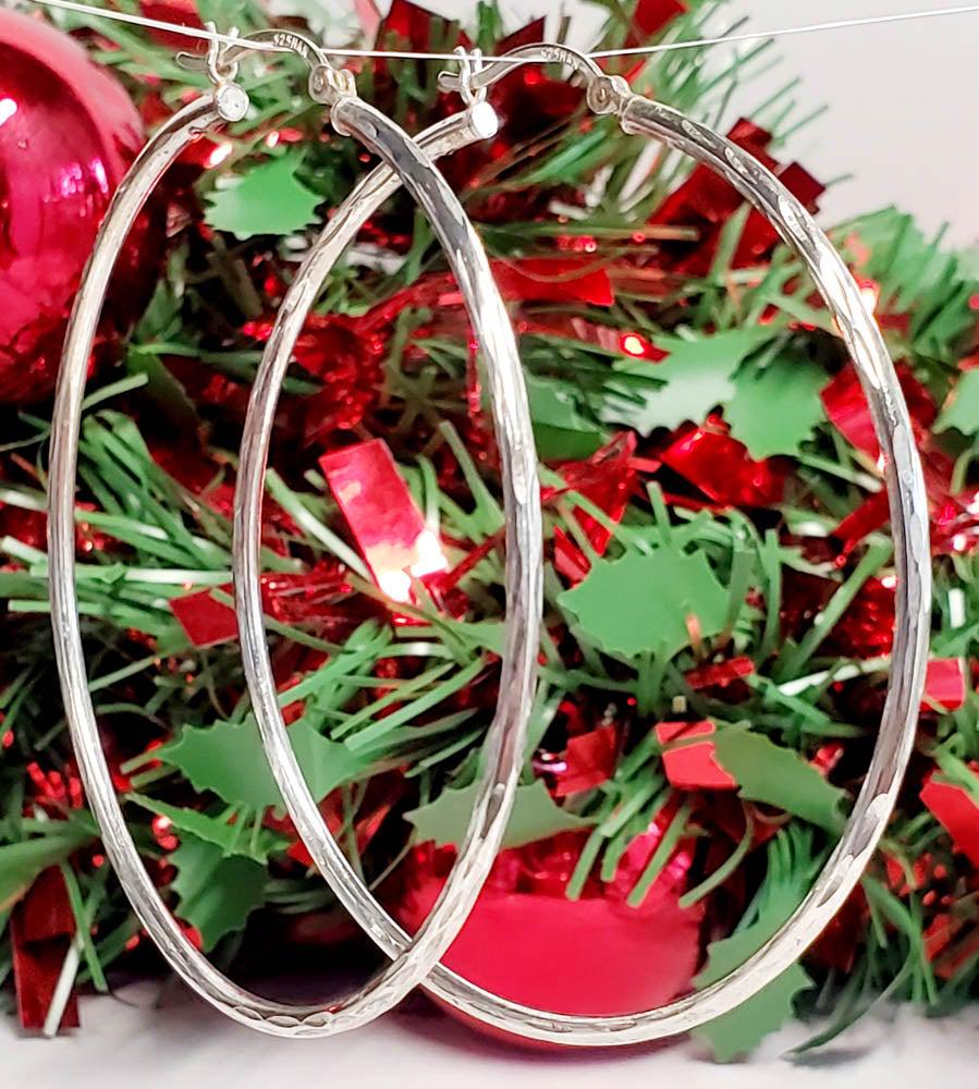 Large Sterling Silver Etched Hoop Earrings: Please see pics for details as this is the exact item you will receive. Measures: EarringsÃ‚ have a 61mm drop and are 2mm wide Weight in Grams: 3.45 Hallmarks & Stamps Include:Ã‚ 925, HAN Pl