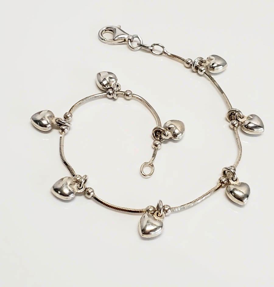 Italy Sterling Silver Heart Beaded Bracelet: Please see pics for details as this is the exact item you will receive.Ã‚ Size: 7.5 InchesÃ‚ Measures: Hearts measure 10.7mm drop and 6mm wide Weight in Grams: 3.29 Hallmarks & Stamps Includ