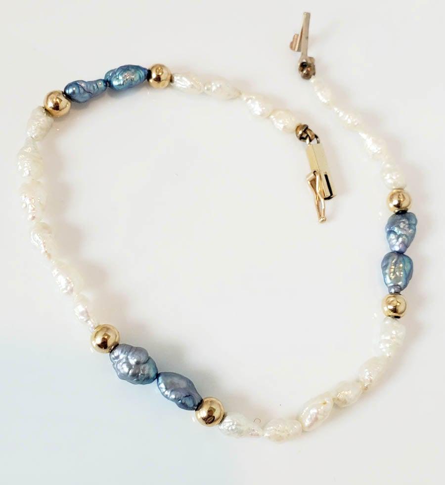 14k Gold Pearl Bracelet 7": Please see pics for details as this is the exact item you will receive.Ã‚ Size: 7 InchesÃ‚ Measures: 4mm at widest Weight in Grams: 1.93 Hallmarks & Stamps Include: 14k Please note: All items ar