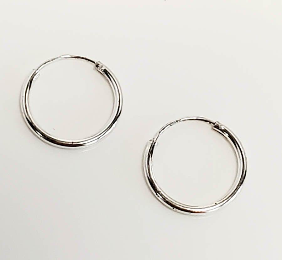 Sterling Silver Hoop Earrings: Please see pics for details as this is the exact item you will receive. Measures: EarringsÃ‚ have a 15.8mm drop and are 1.4mm wide Weight in Grams: .53 Hallmarks & Stamps Include: 925, IBB, TH 